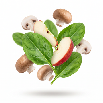 Balance After Meals: a bunch of green spinach leaves, mushrooms, and red apple slices