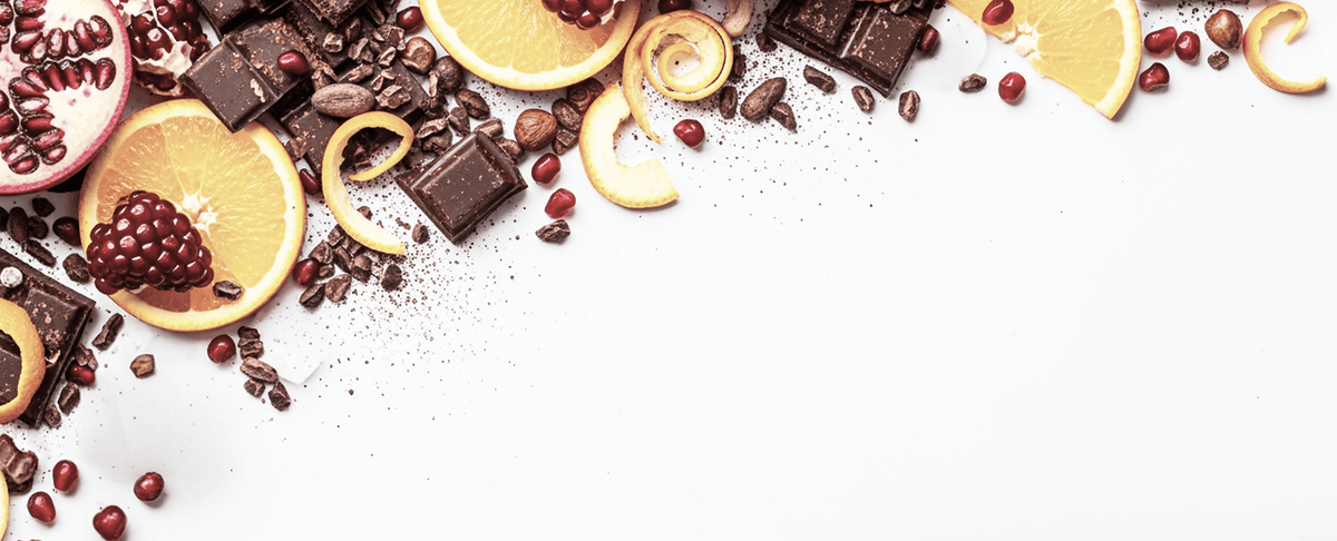A minimalist white background with decorative food elements along the top edge